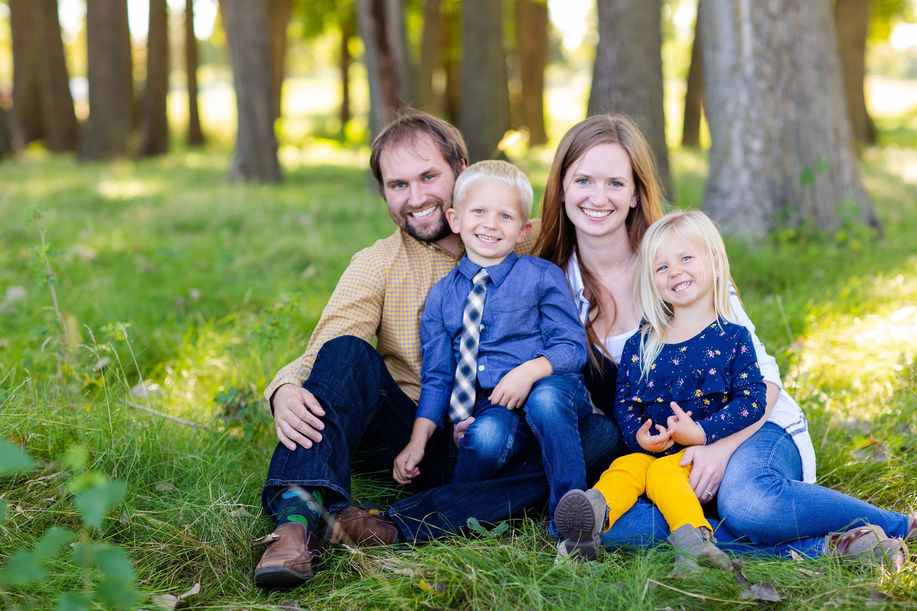 family outdoors porch swing store